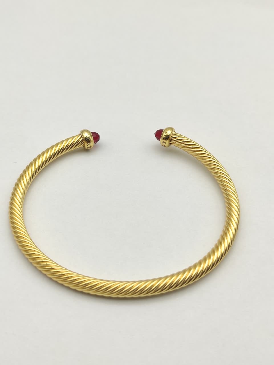 David Yurman Gold Tone Wire Bangle Bracelet with Red Gemstone